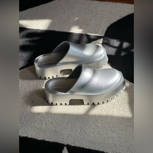 Jeffrey Campbell clogs size 10, brand new condition.